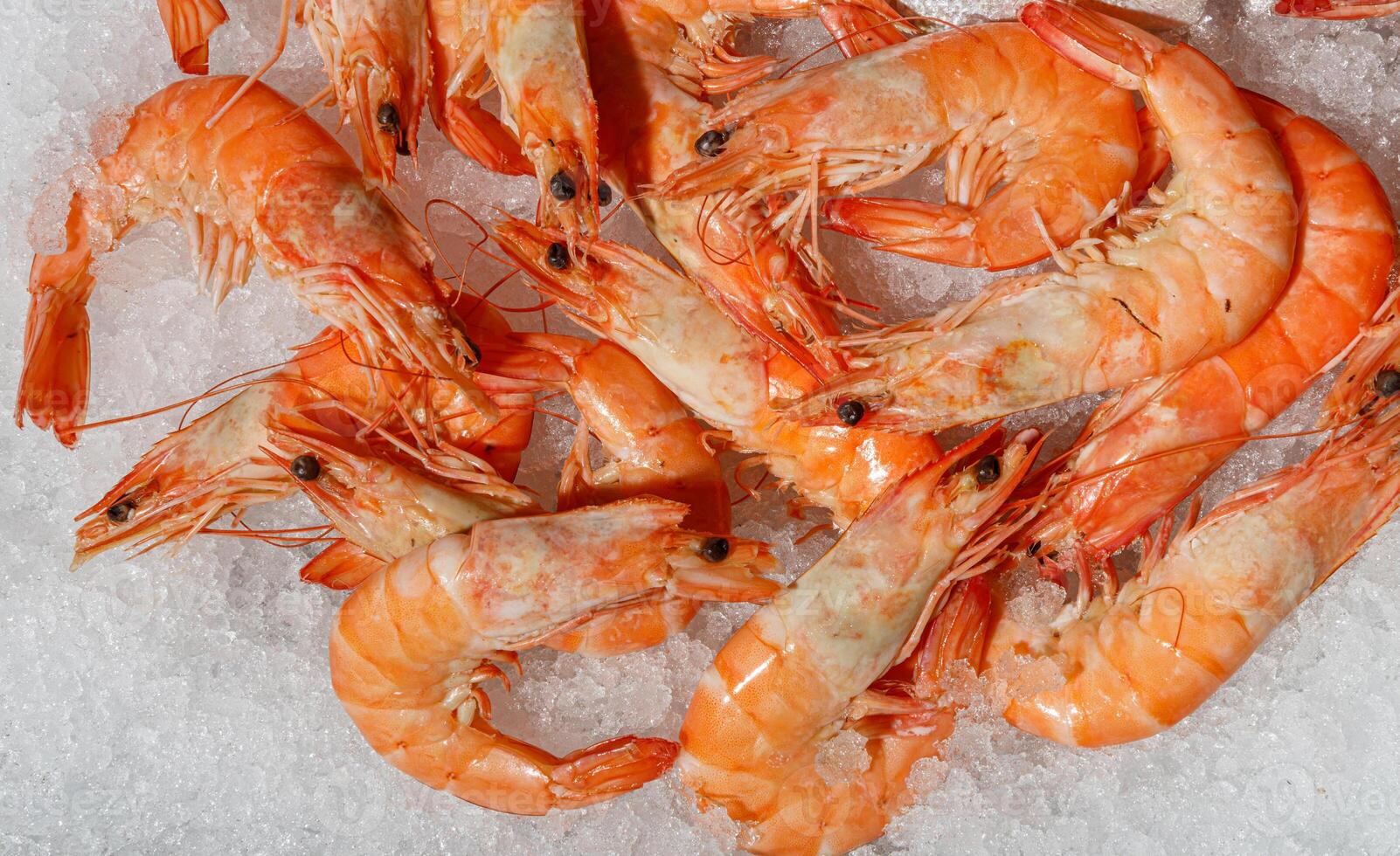Experience the exquisite Fresh Seafood Shrimp beautifully presented on Ice for Culinary Delights photo