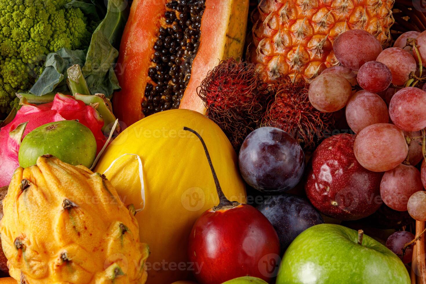 An incredibly vibrant assortment of fresh, delicious fruits and vegetables for everyone to enjoy photo