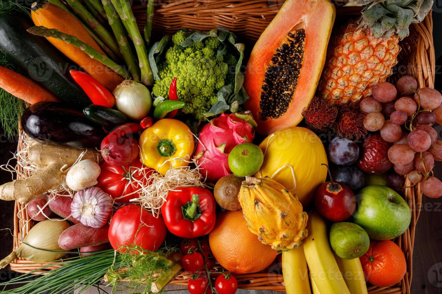 A Colorful and Vibrant Assortment of Fresh Fruits and Vegetables in a Beautiful Basket photo