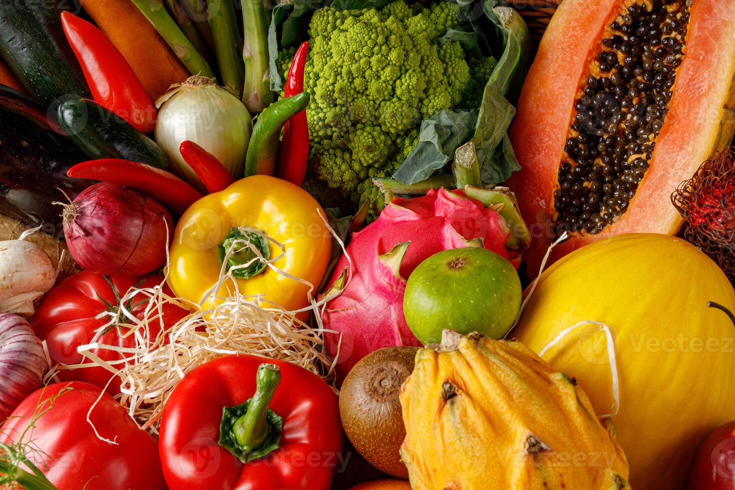 A Rich and Abundant Collection of Fresh Vegetables Nestled Together with Fresh Fruits photo