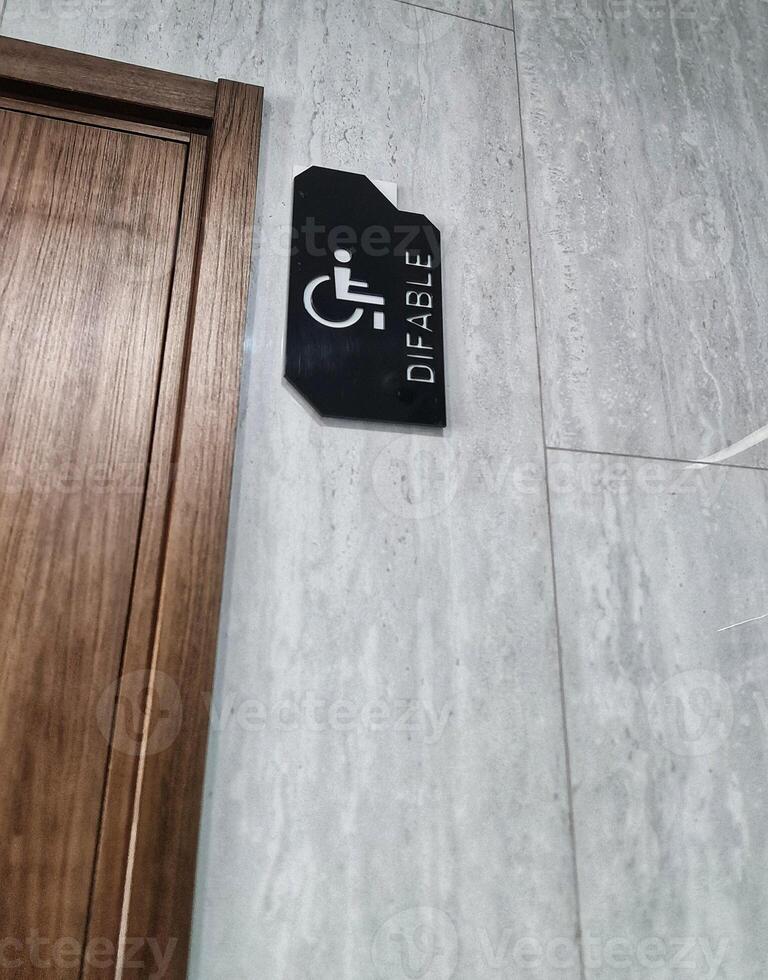 Navigating Accessibility Identifying Door to Disabled Restroom for Inclusive Design photo