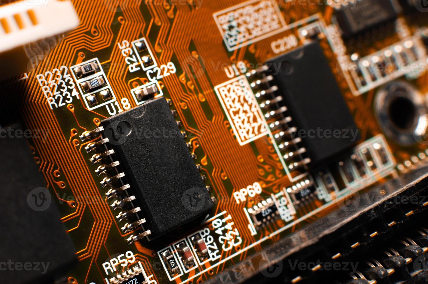 Printed circuit board, close-up. Small microprocessor, microcontroller on the motherboard of a modern desktop PC, macro of an object, close-up, shallow depth of field, nobody photo