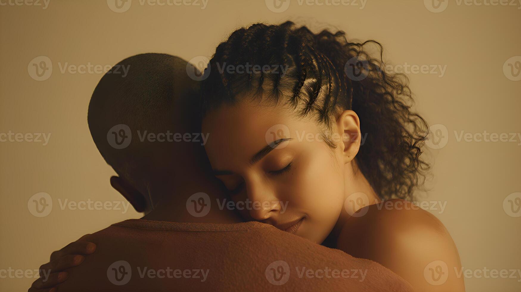Couple embracing in soft lighting photo