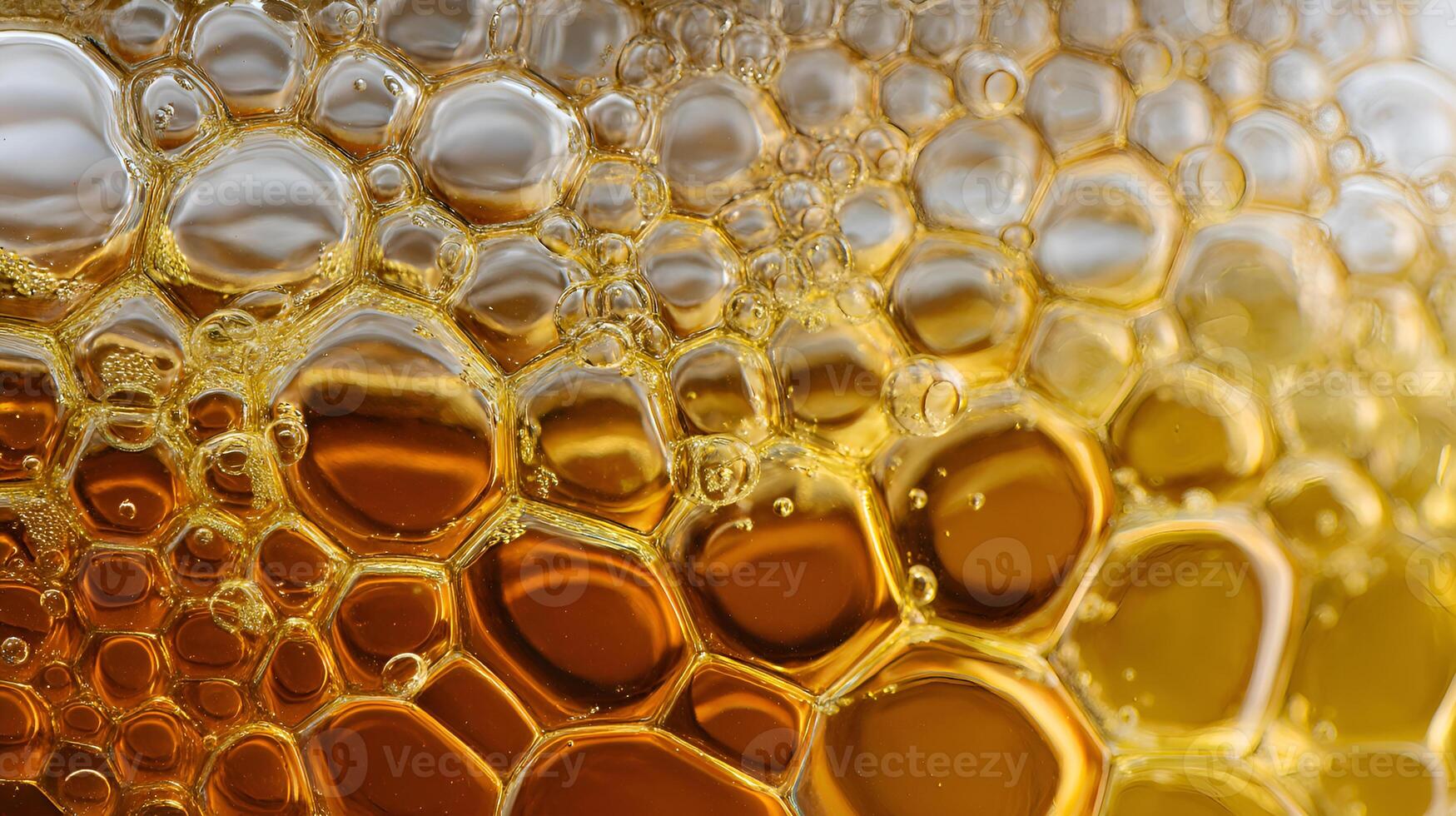 Golden oil bubbles creating an abstract pattern background photo
