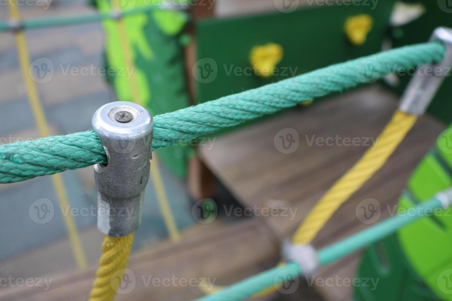Colorful Playground Equipment Featuring a Unique Rope Structure for Active Fun and Adventure photo