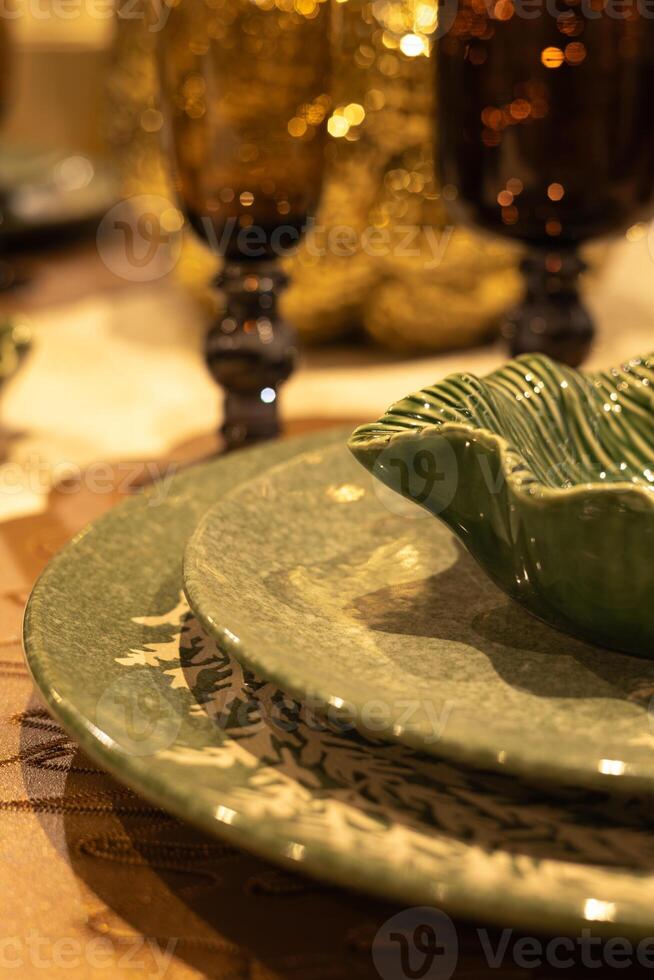 Ceramic tableware on the table in a restaurant. Selective focus. photo