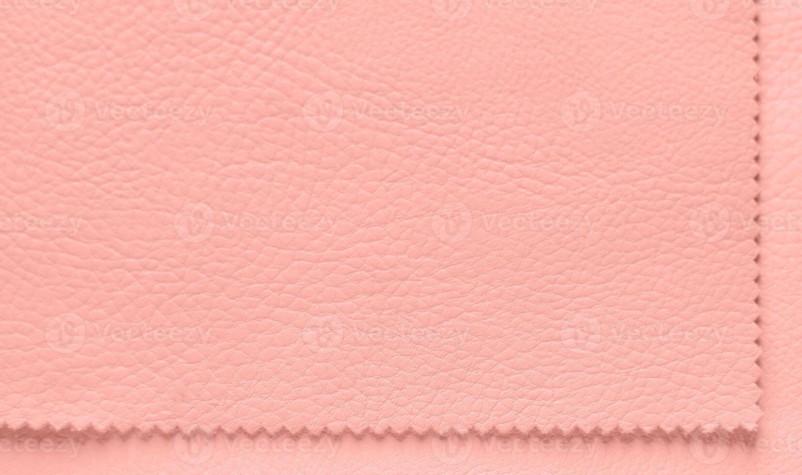 A luxurious background with a delicate pink leather texture. Close-up of artificial leather. view from above. Eco-friendly leatherette, rough artificial leather structure. Wallpaper, copy space photo