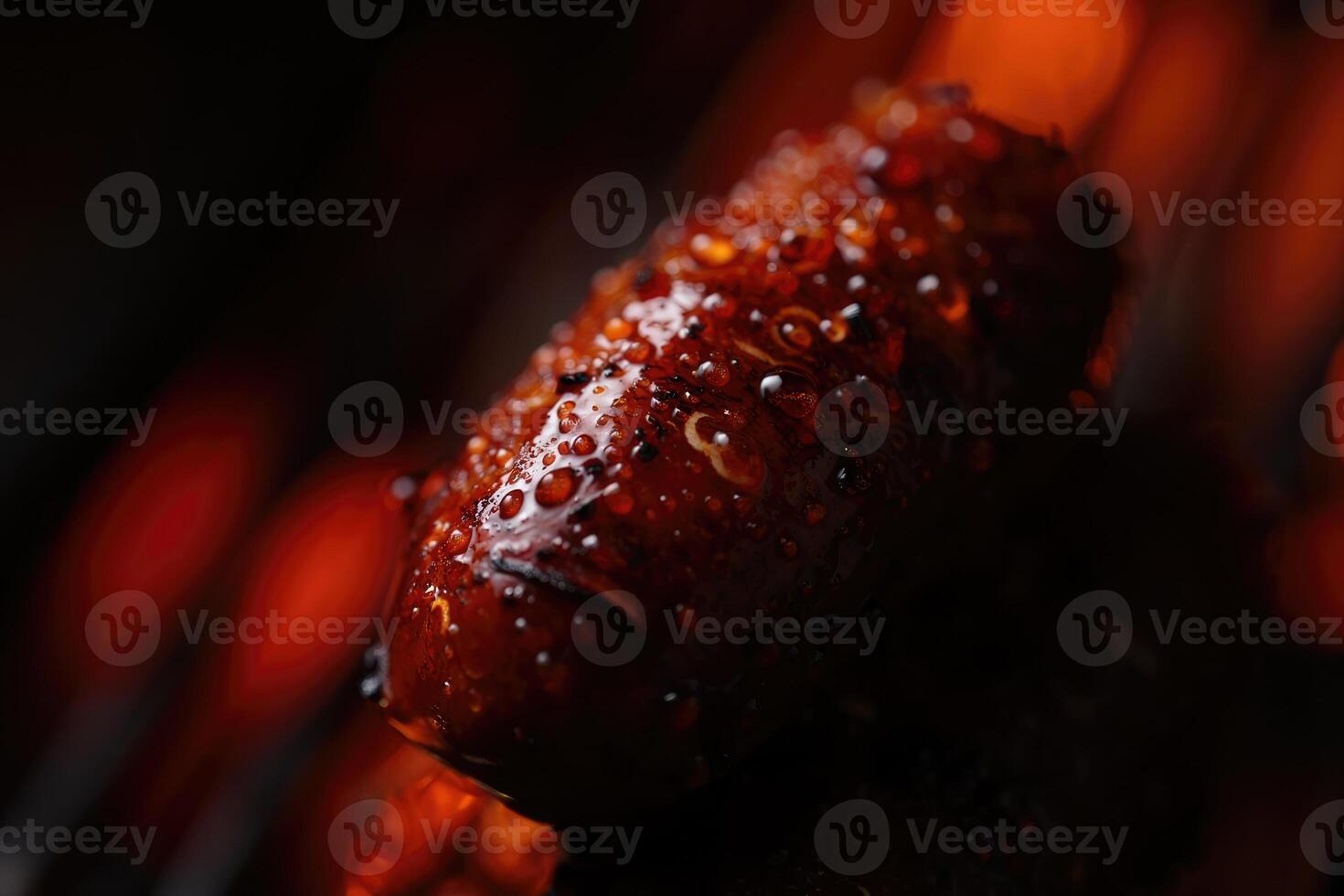 A mouthwatering close up of a sizzling, grilled sausage, ready to be enjoyed. photo