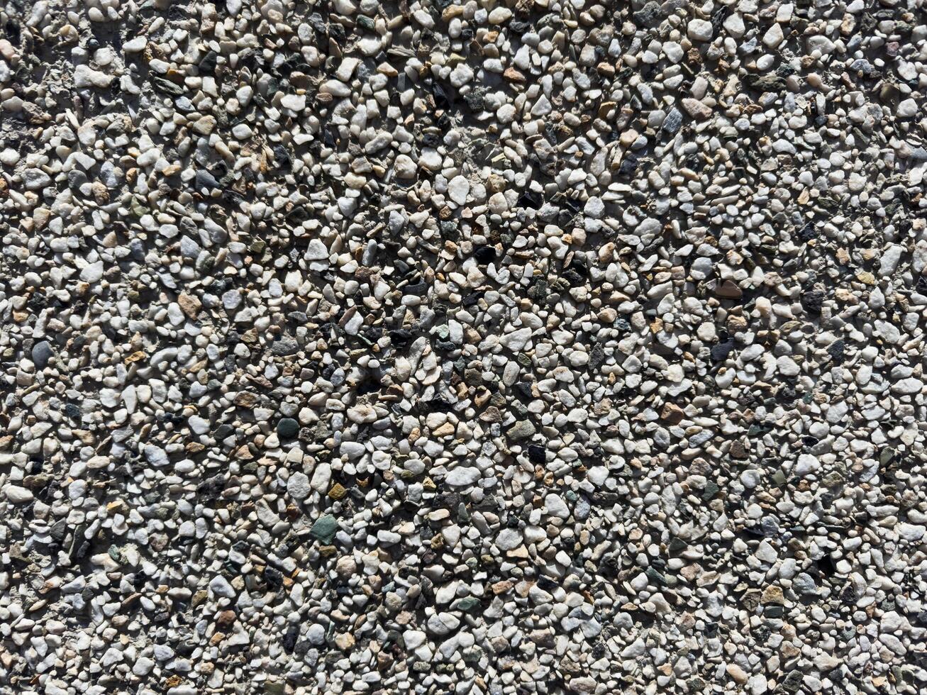 Small stones background, small stones, textured wall photo