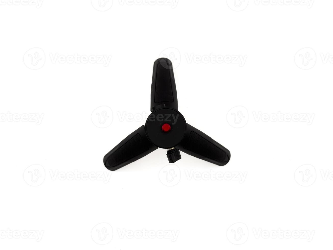 A tripod with a red and black head on a white background, top view photo
