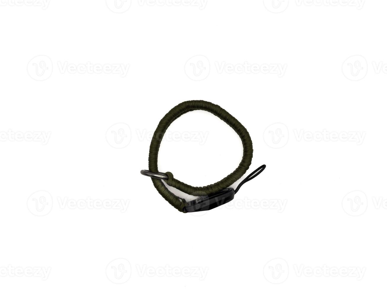 Green strap in the form of a rope on a white background. copy space, top view, flay lay photo
