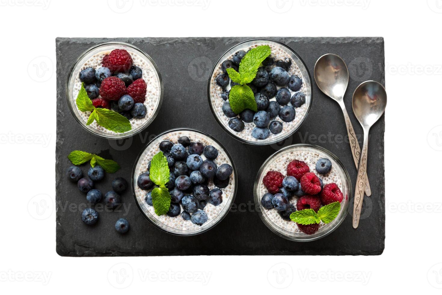 Berry parfaits with mint leaves photo