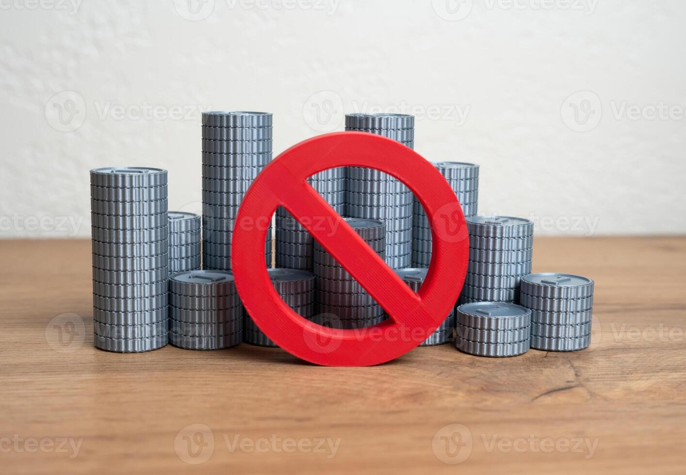 Money coins and a prohibition sign. Abandonment of metal denominations of the national currency. Monetary reform. Inflation control, currency redesign, or modern payment evolution. photo