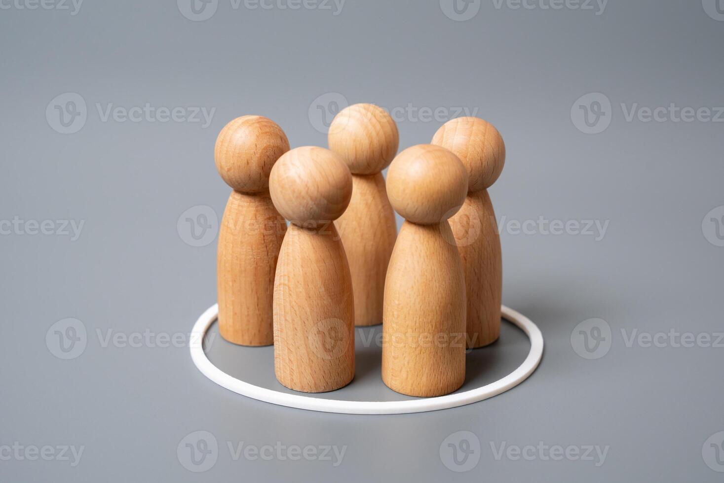 A group of human figures in a white circle. A selection of people. Recruitment, survey sampling, or targeted focus groups. Targeted marketing photo