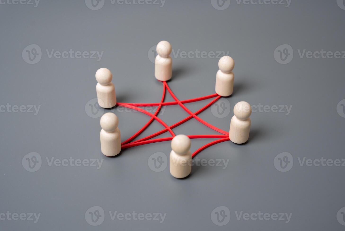 People in a circle are connected by lines and connections. Teamwork, digital connectivity, or interlinked systems. Networking, social interaction, corporate structures, or tech ecosystems. photo