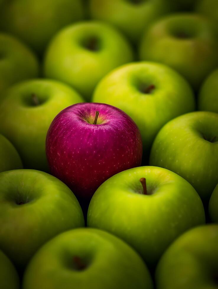 A Single Red Apple Among Many Green Apples A Study in Contrast. photo