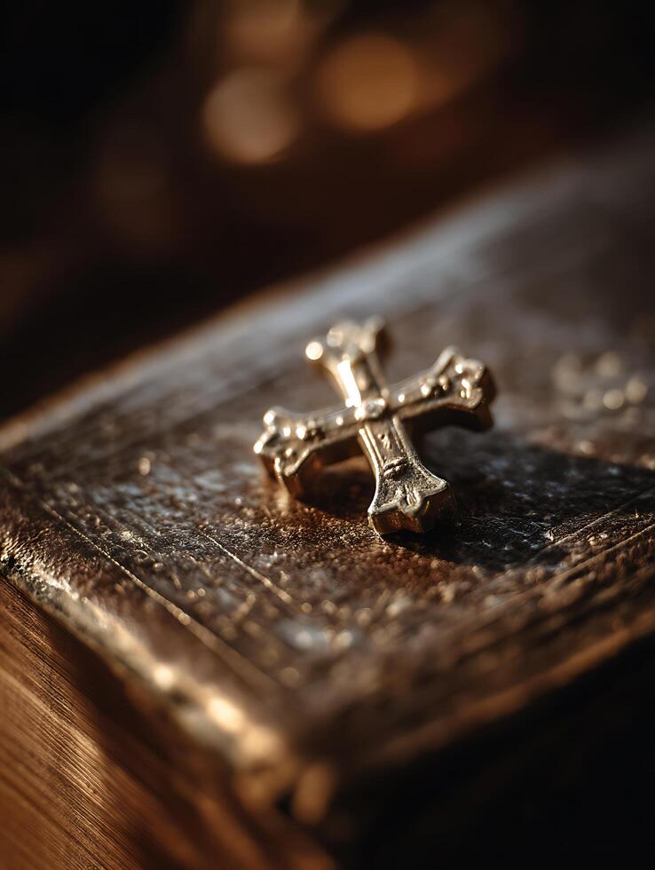 Golden Cross Resting on Antique Book Close Up Still Life Photography. photo