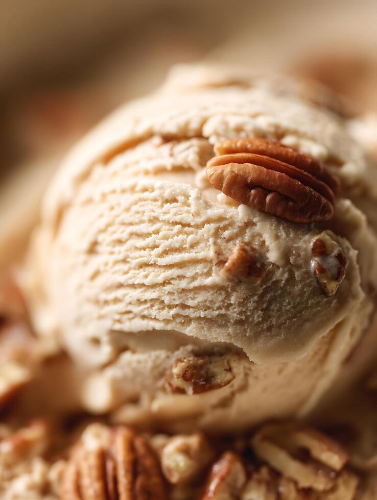 Close Up of Creamy Pecan Ice Cream with Visible Nut Pieces. photo
