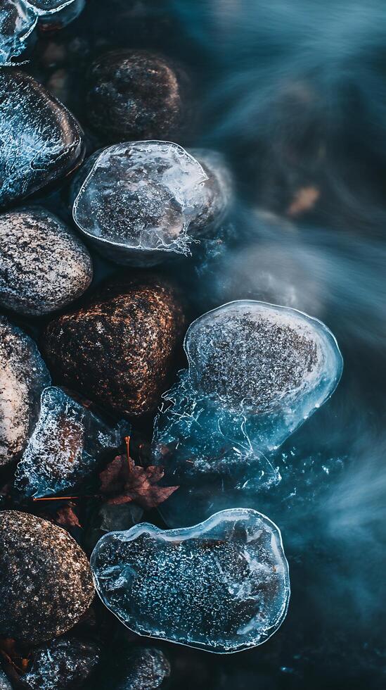 Frozen River Stones A Close Up of Winter's Embrace. photo