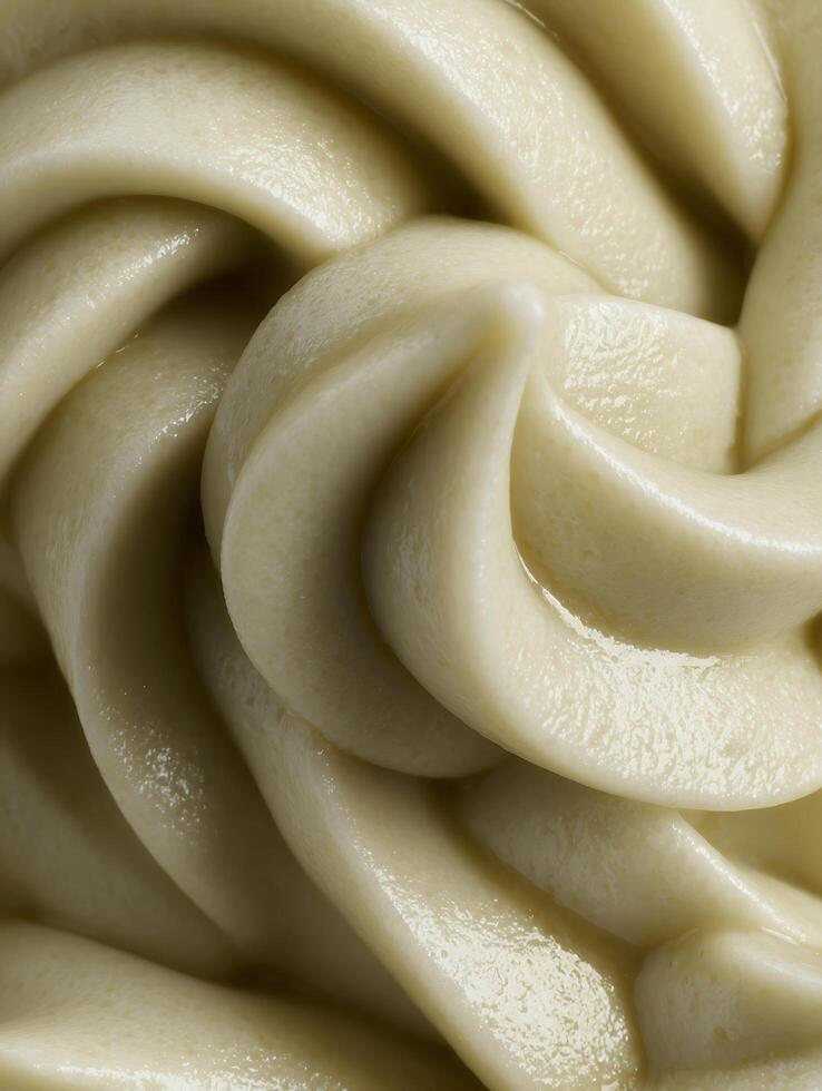 Close Up of Creamy, Swirled Food Texture, Ideal for Culinary or Cosmetic Backgrounds. photo