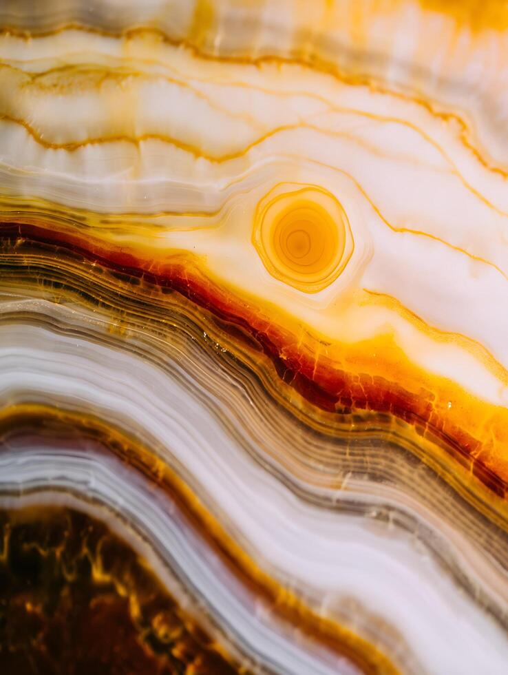 Abstract Agate Stone Texture Close up of swirling yellow and white patterns. photo