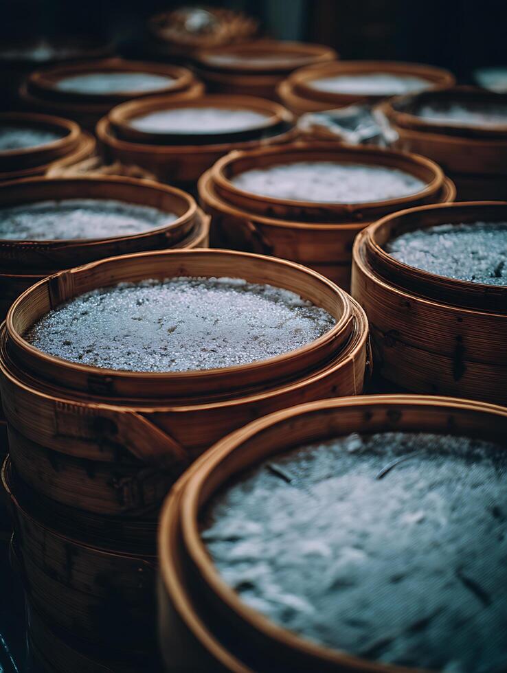 Close up of Steaming Bao Buns in Traditional Bamboo Steamers. photo