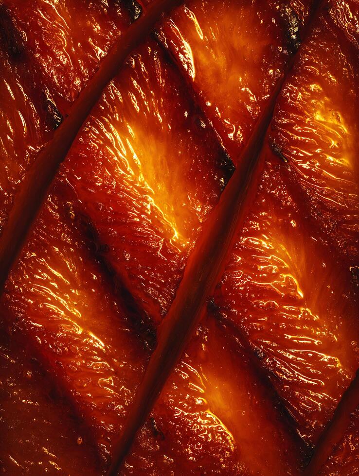 Close up of caramelized pineapple, showing rich texture and color. photo