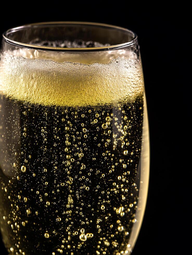 Close up of Sparkling Wine in a Glass, Bubbles and Foam Detail. photo