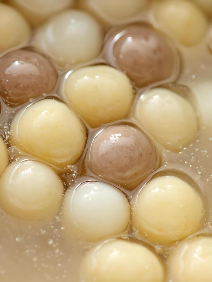 Close Up of Sweet Tapioca Pearls in Syrup, Delicious Asian Dessert. photo