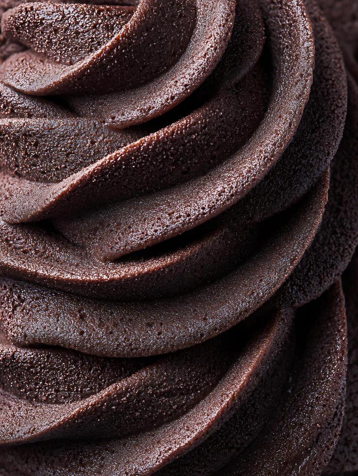 Close Up of Swirled Chocolate Ice Cream, Rich and Creamy Texture. photo