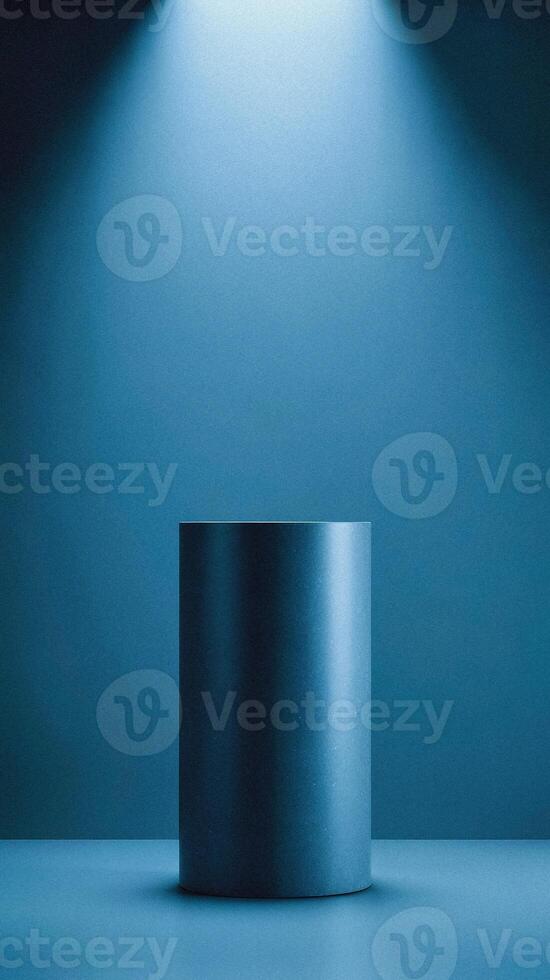 Clean blue cylindrical shape under spotlight set against a tone-matching background perfect for minimalist object photography. photo