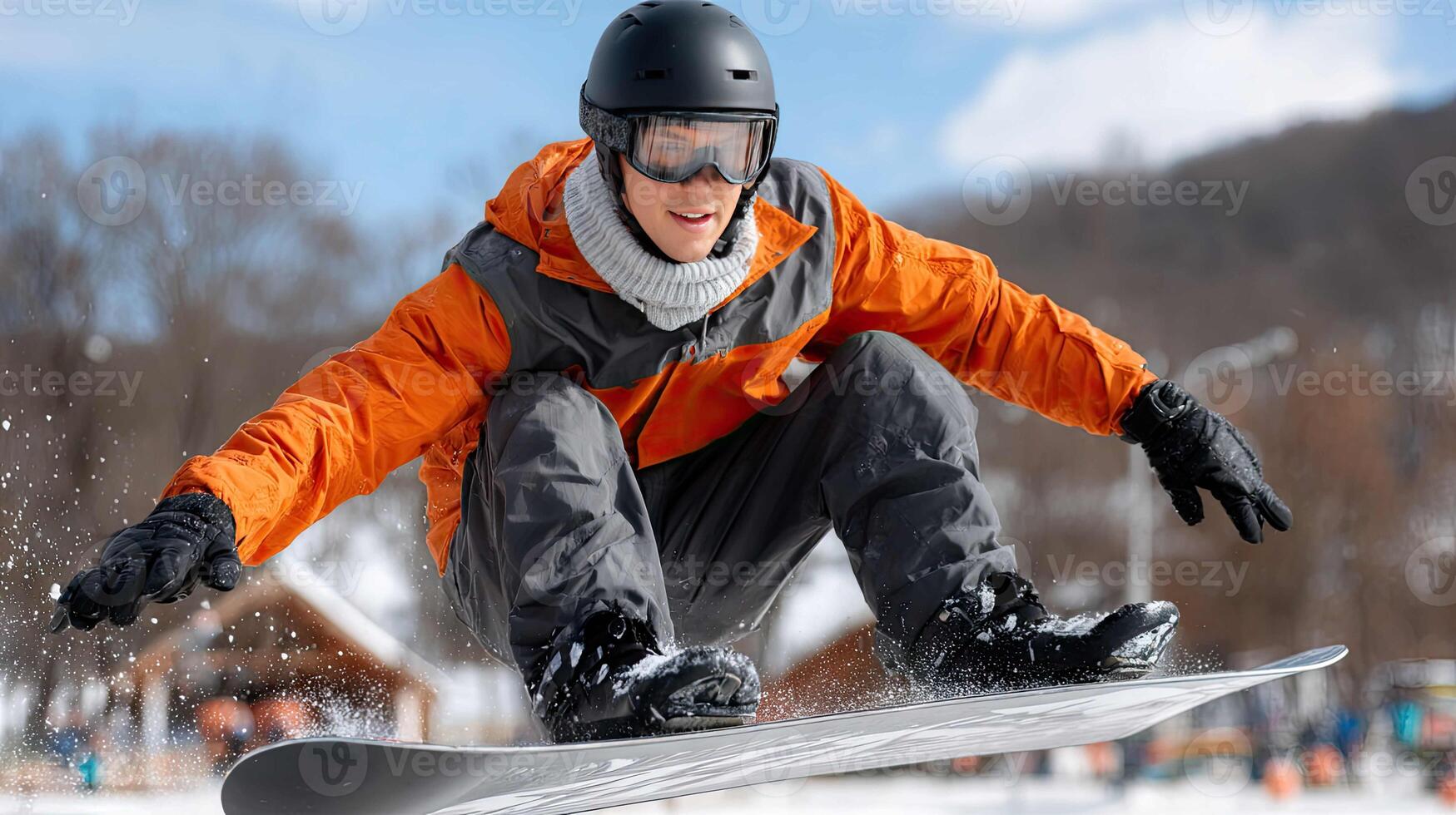 A man on a snowboard in the air photo