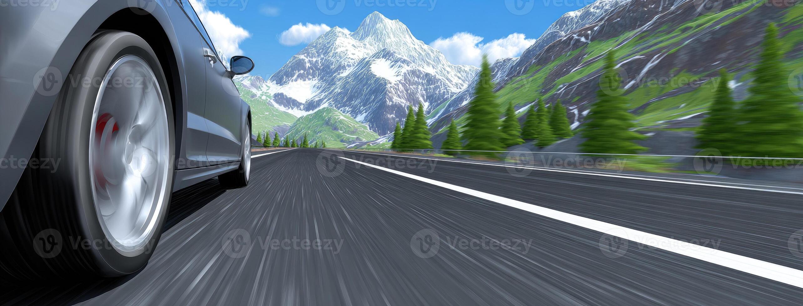 A car driving on a mountain road with mountains in the background photo