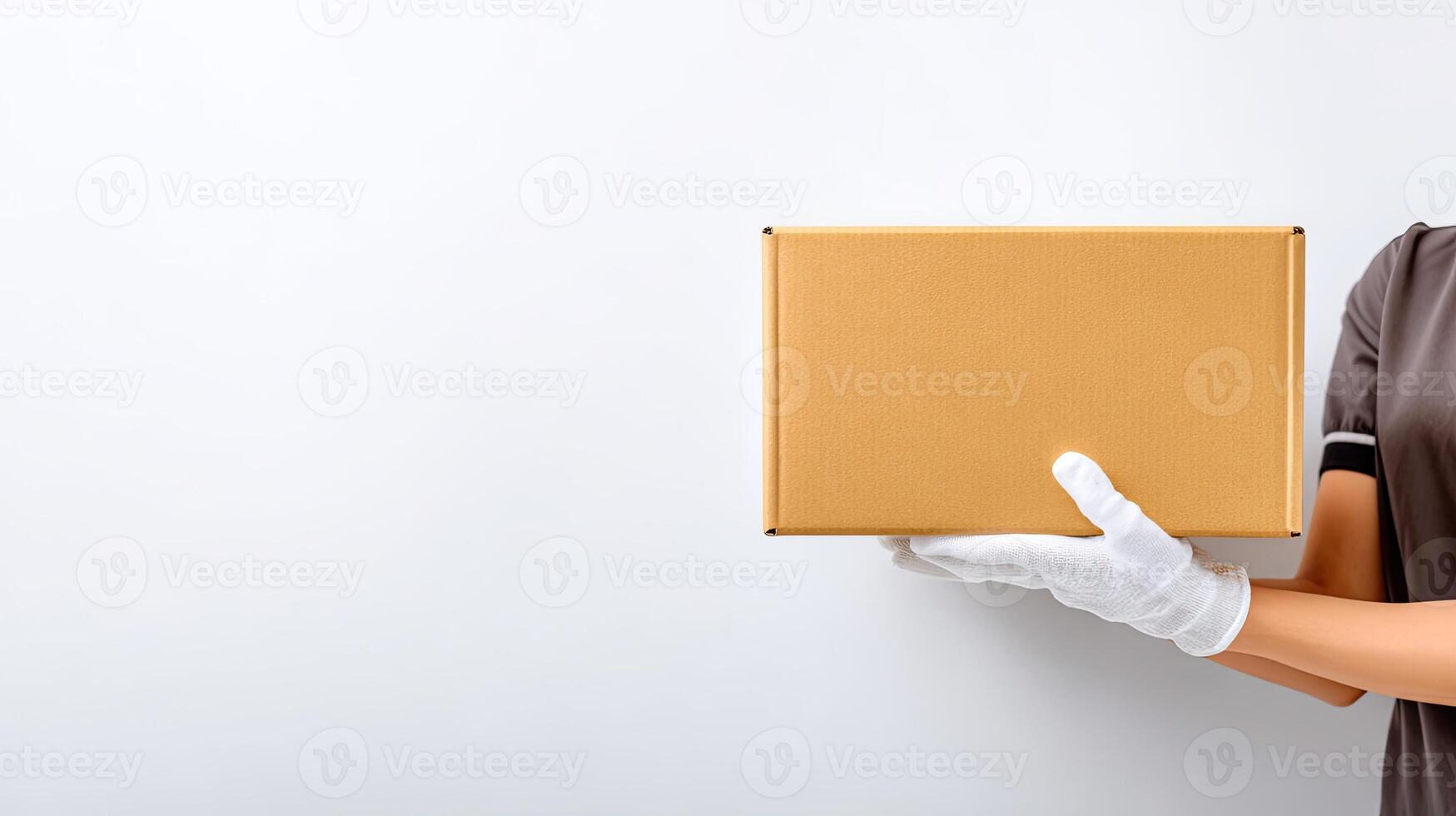 A woman in white gloves holding a box photo