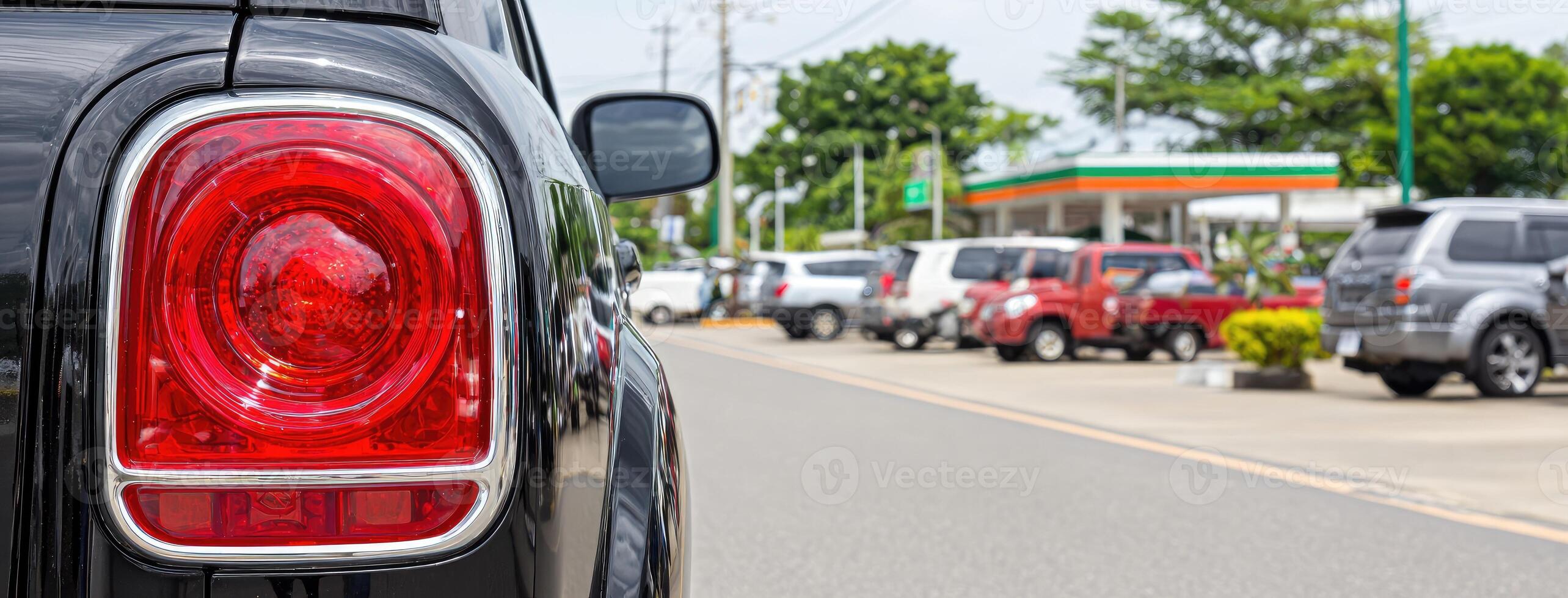A red light on the tail end of a car photo