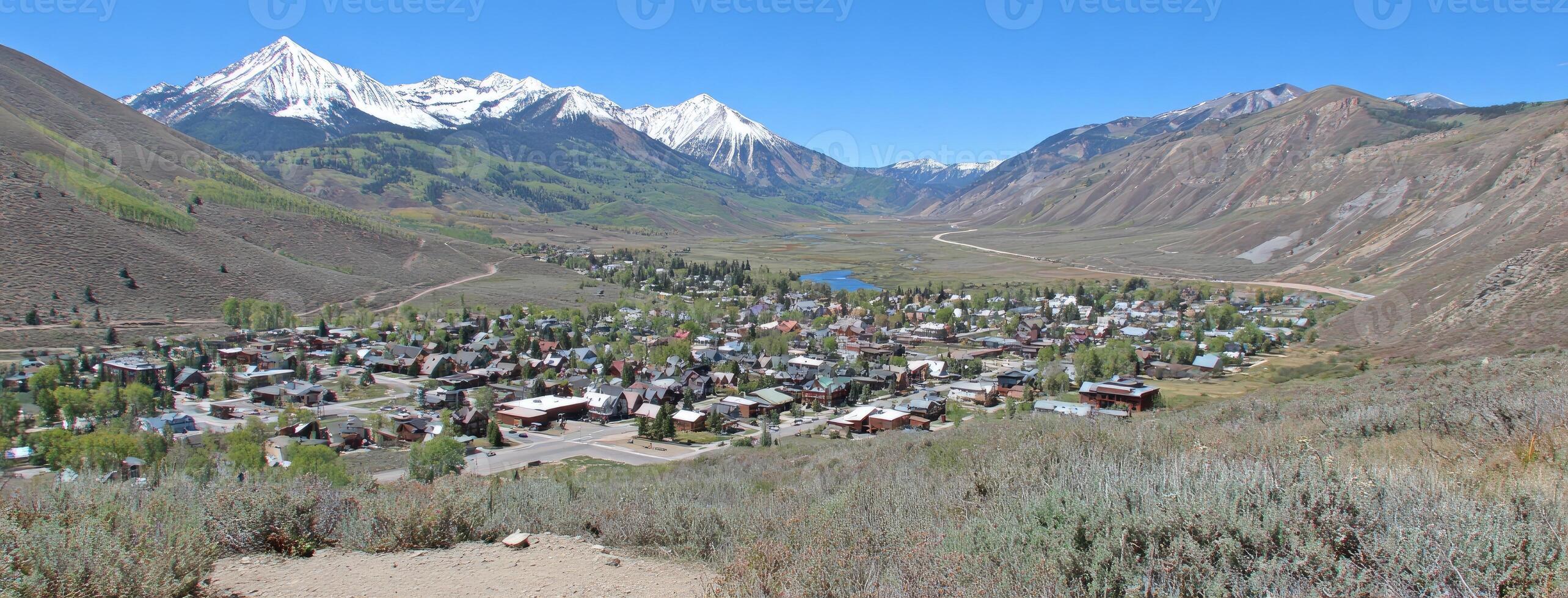 A view of a small town in the mountains photo