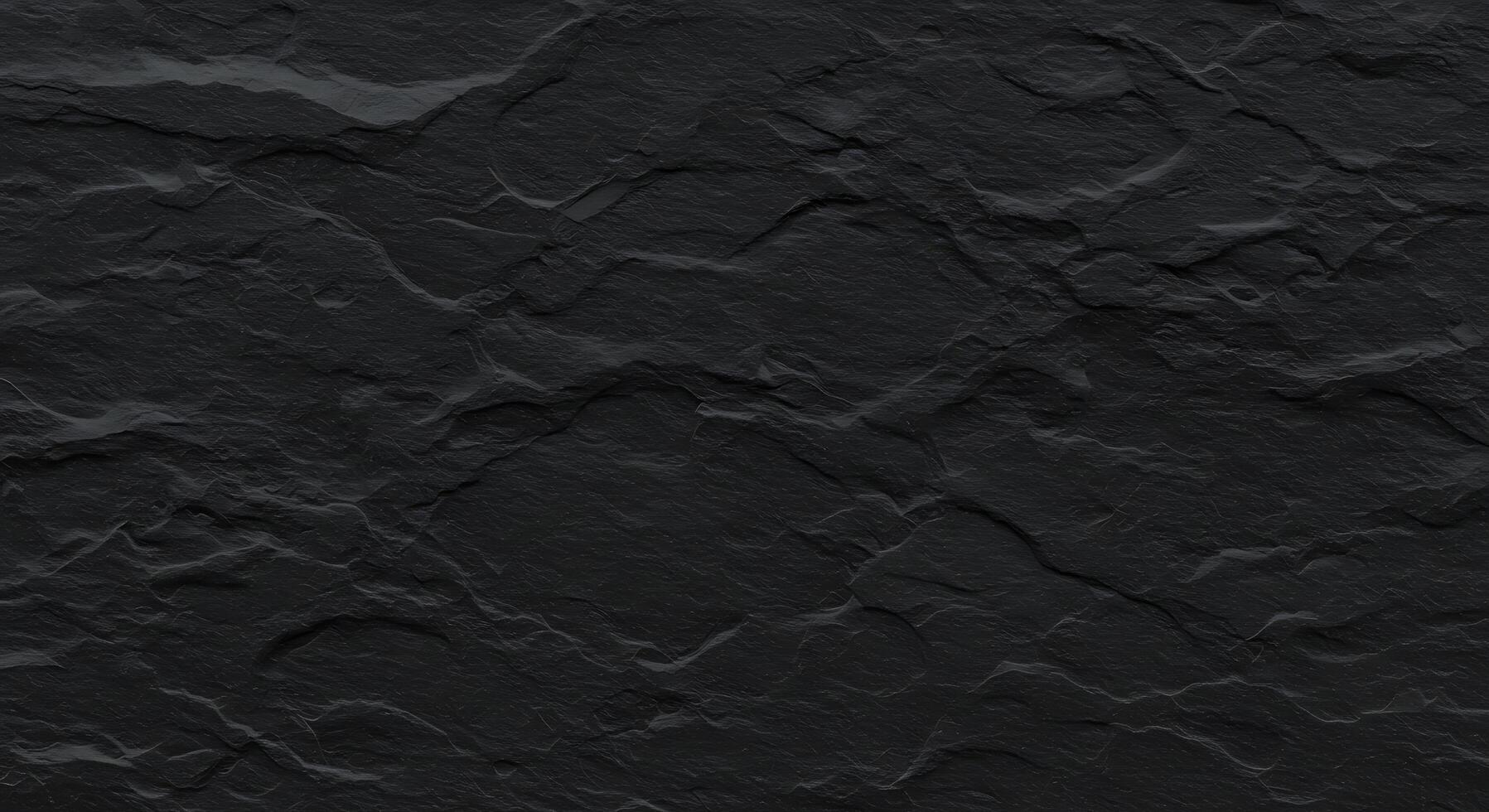 A black stone wall with a texture of a rock photo