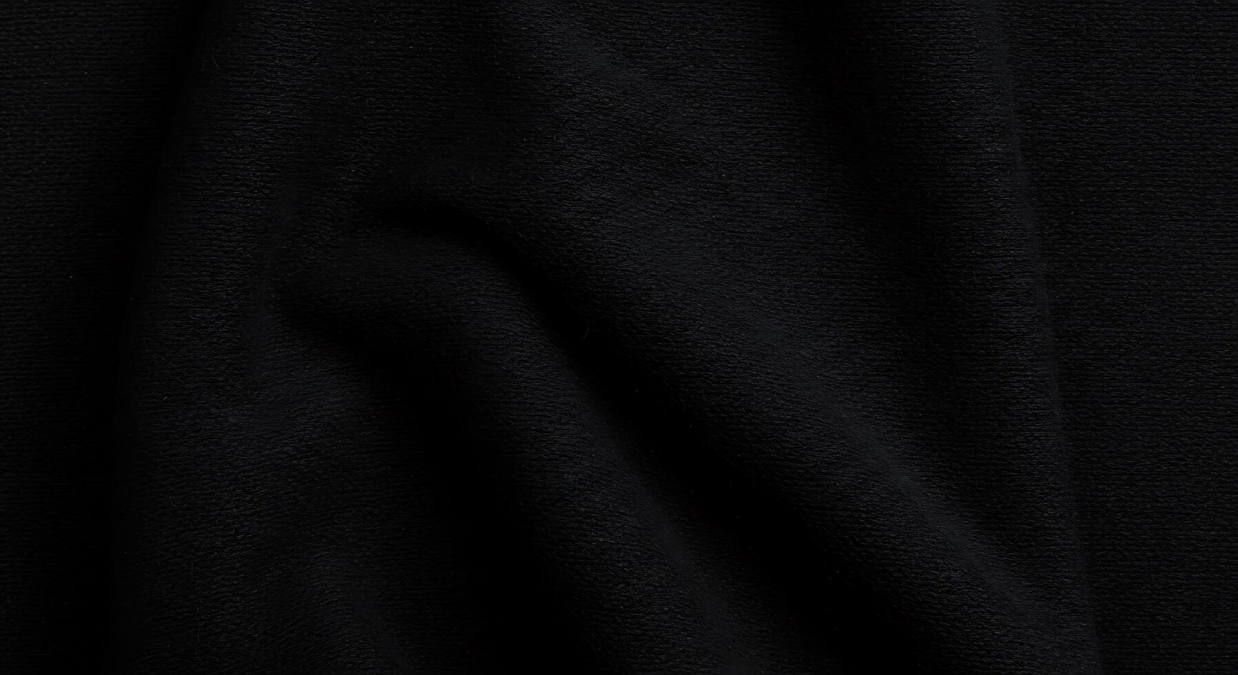 A black fabric with a dark color photo