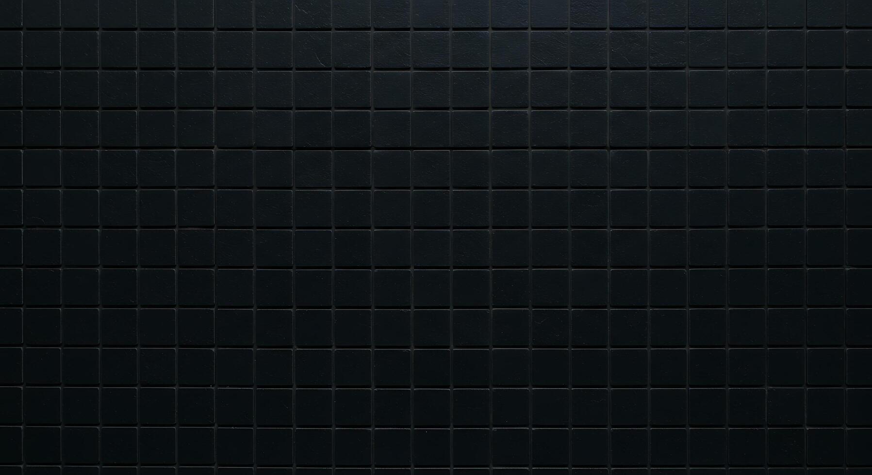Black tile wall background photo