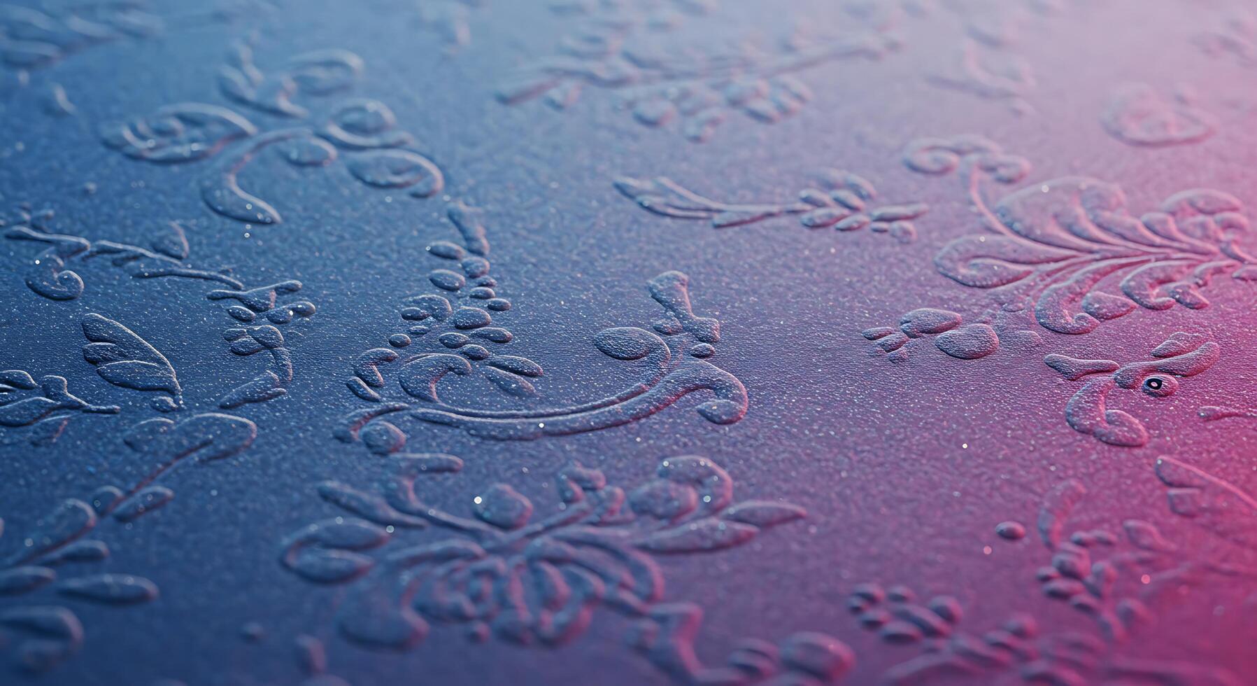 A close up of a blue and pink background with floral designs photo