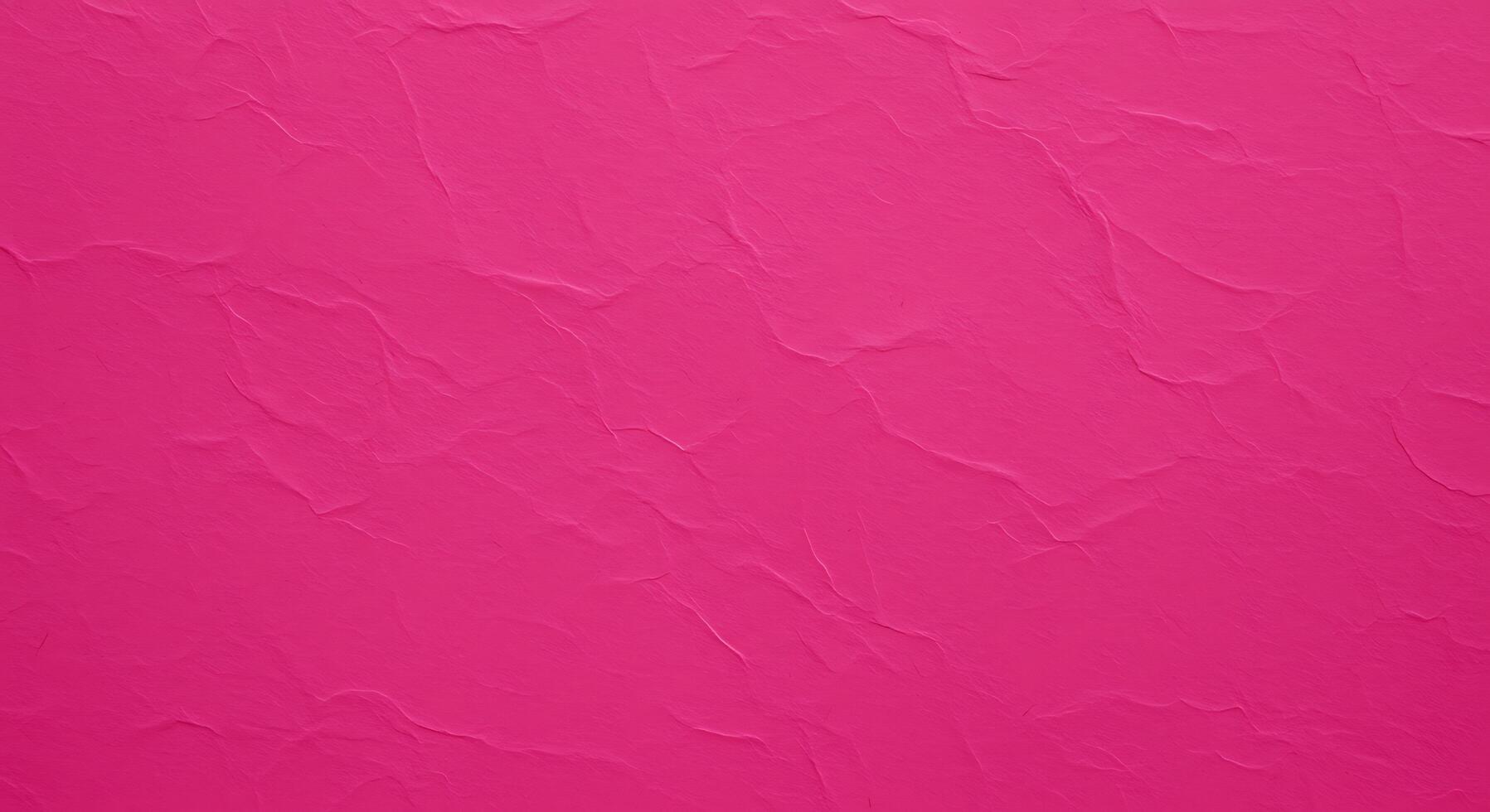 A pink wall with a texture of paper photo
