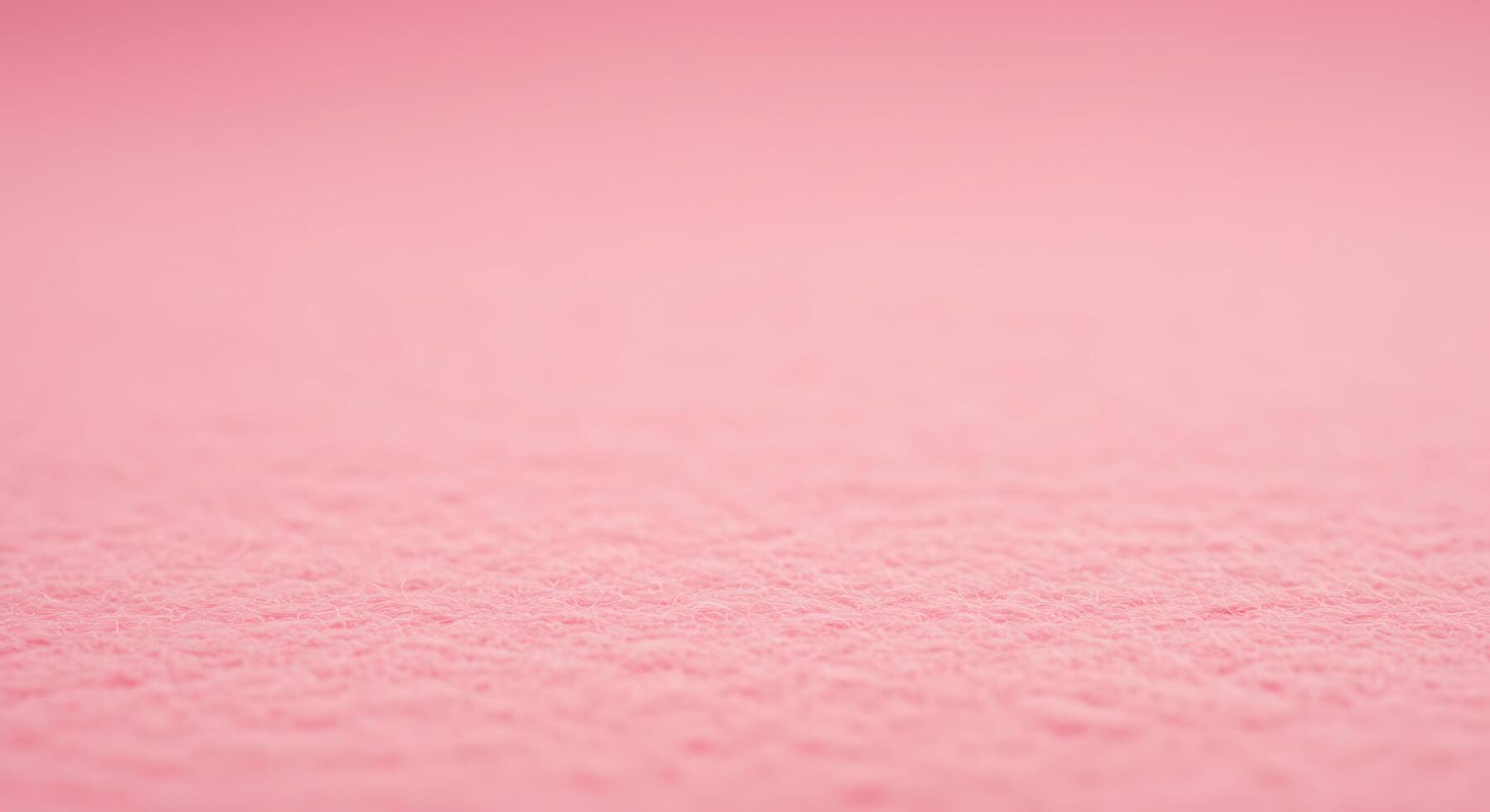 A pink background with a small amount of snow photo