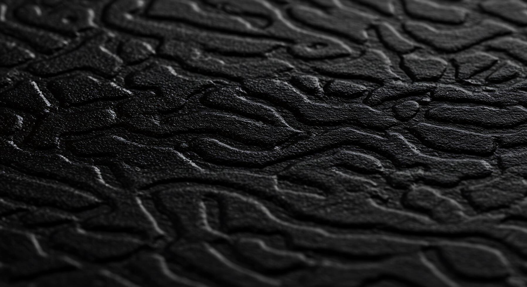A black leather surface with a pattern of small dots photo