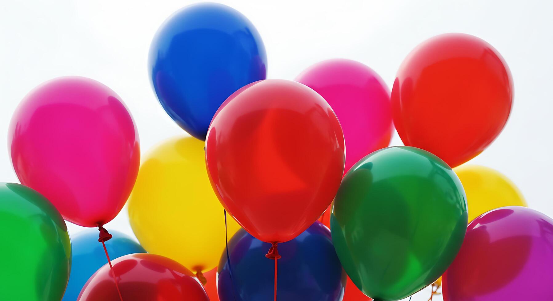 Many colorful balloons are shown in the air photo