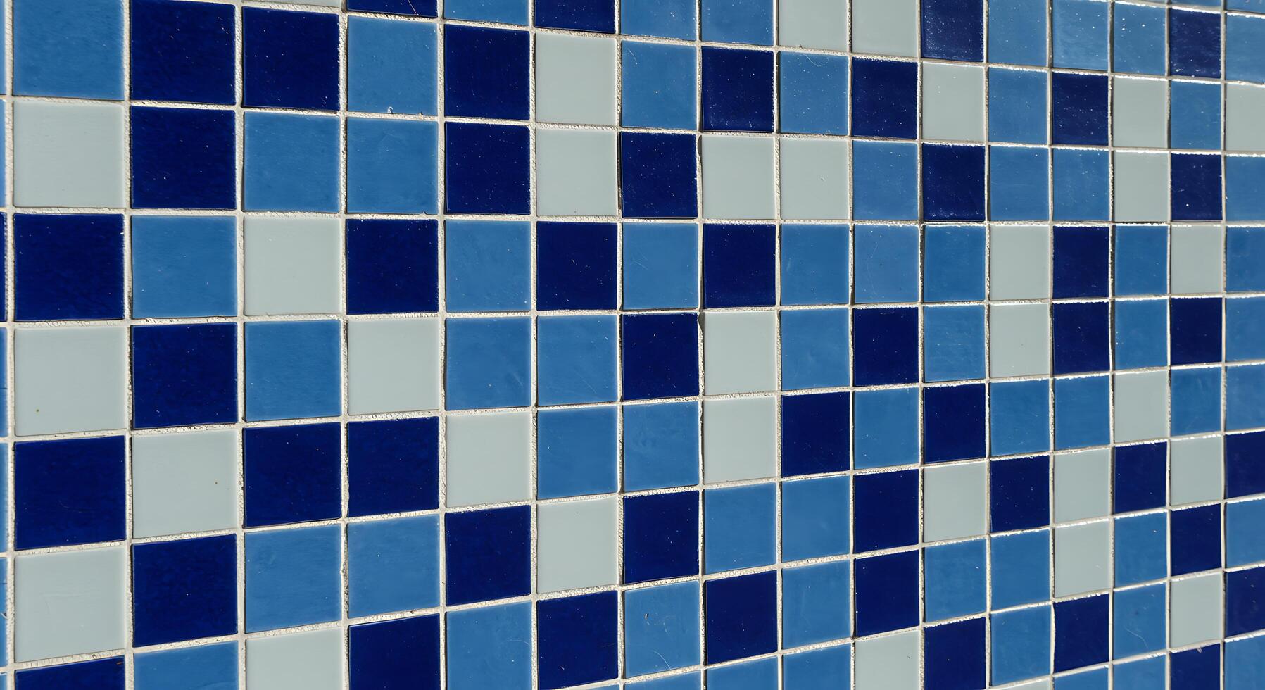 A blue and white tiled wall photo