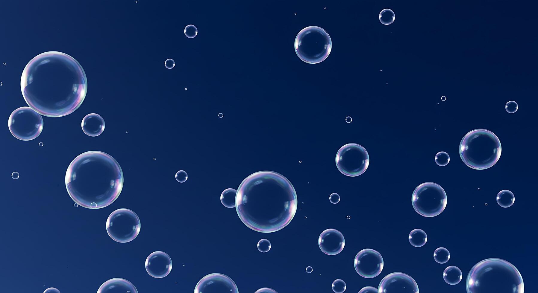 Soap bubbles floating in the air on a blue background photo