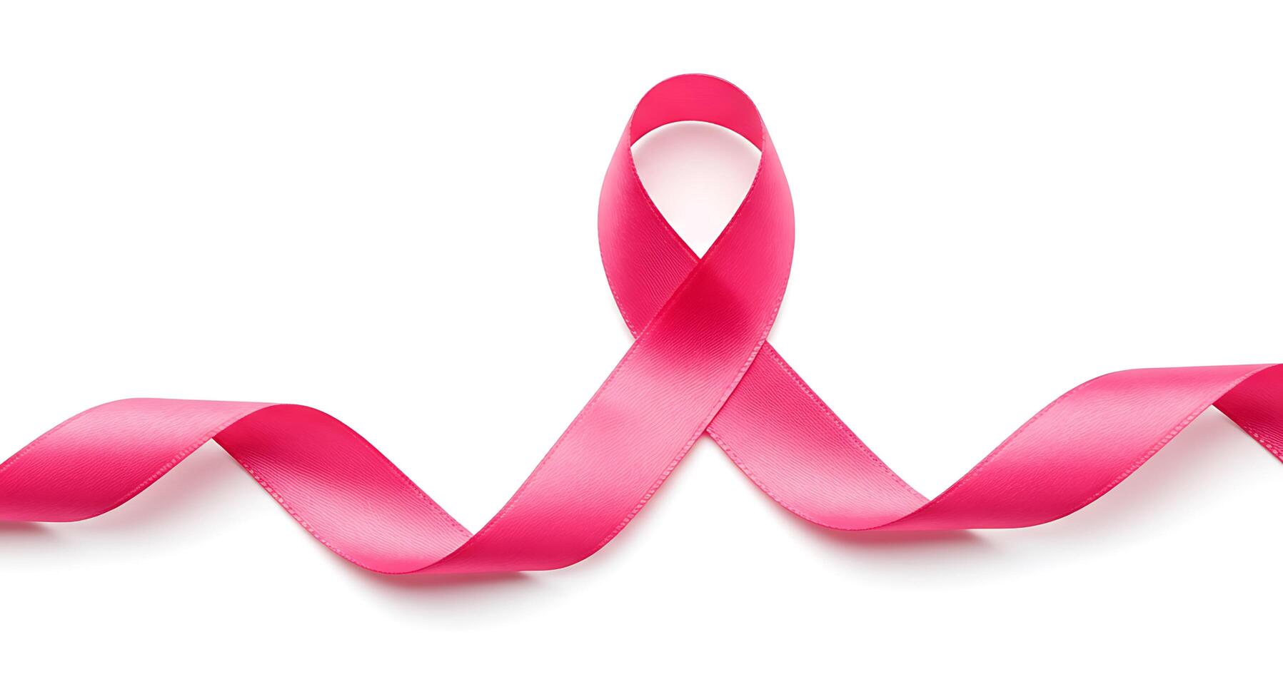 Pink ribbon on white background photo