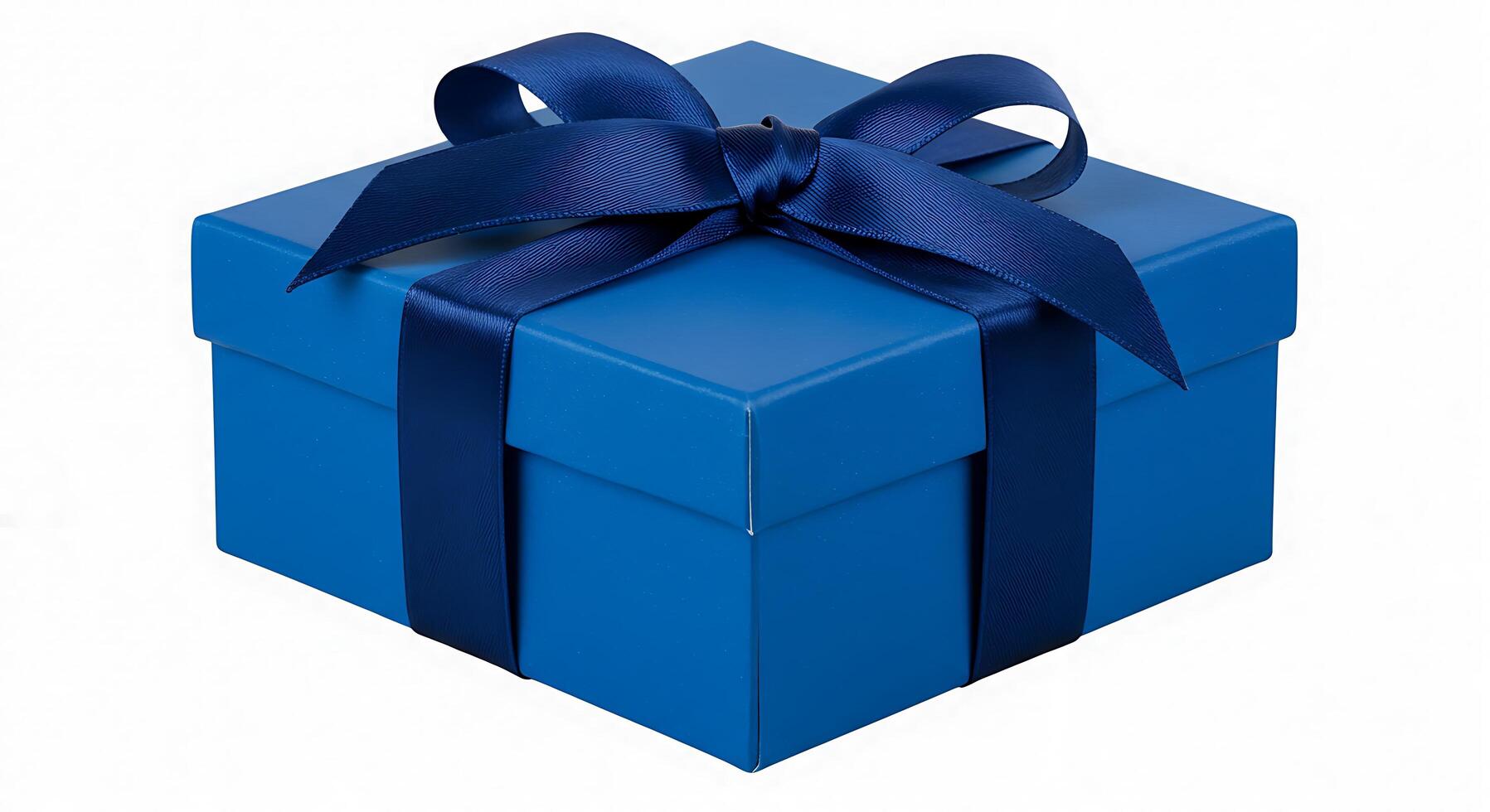 A blue gift box with a bow tied to it photo