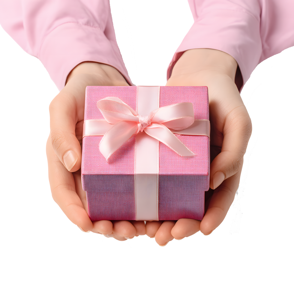 Woman holding a pink gift box with a bow in her hands isolated on transparent background png