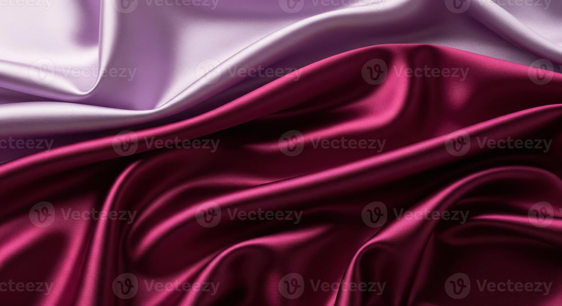 A close up of a purple and pink satin fabric photo